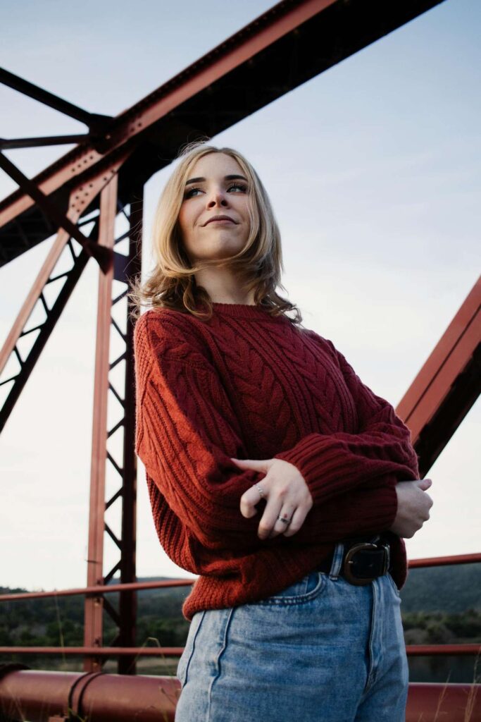 Girl Posing in Red Sweater